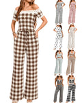 Conjunto con hombros al aire, ribete de encaje y pantalones de pierna ancha a rayas