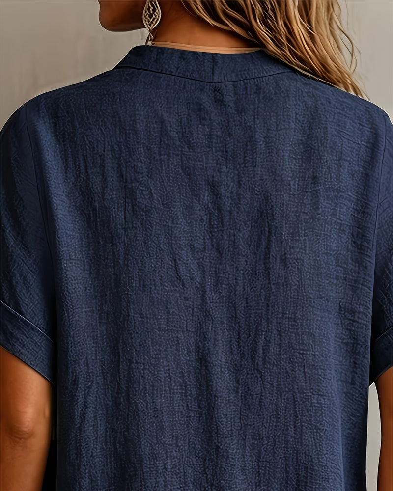 Blusa con cuello en V, manga corta y corte holgado