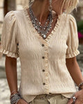 Blusa plisada con volantes, cuello en V y mangas abullonadas