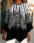 Blusa con cuello redondo, estampado de leopardo y corte irregular