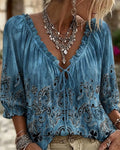 Blusa con cuello redondo, mangas tres cuartos y corbata