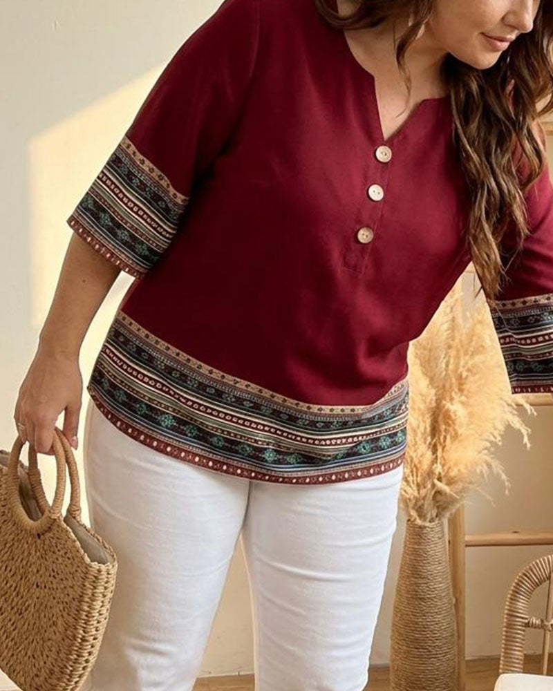 Blusa de rayas de estilo étnico con manga tres cuartos