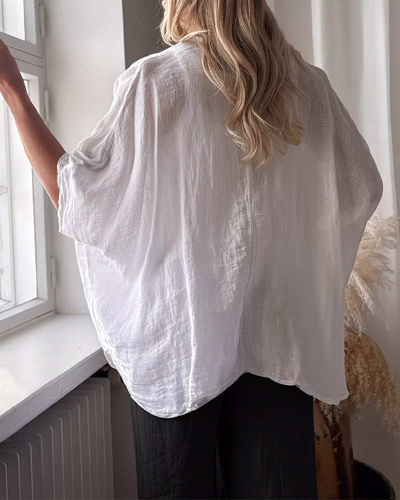 Blusa holgada con mangas de murciélago, lisa