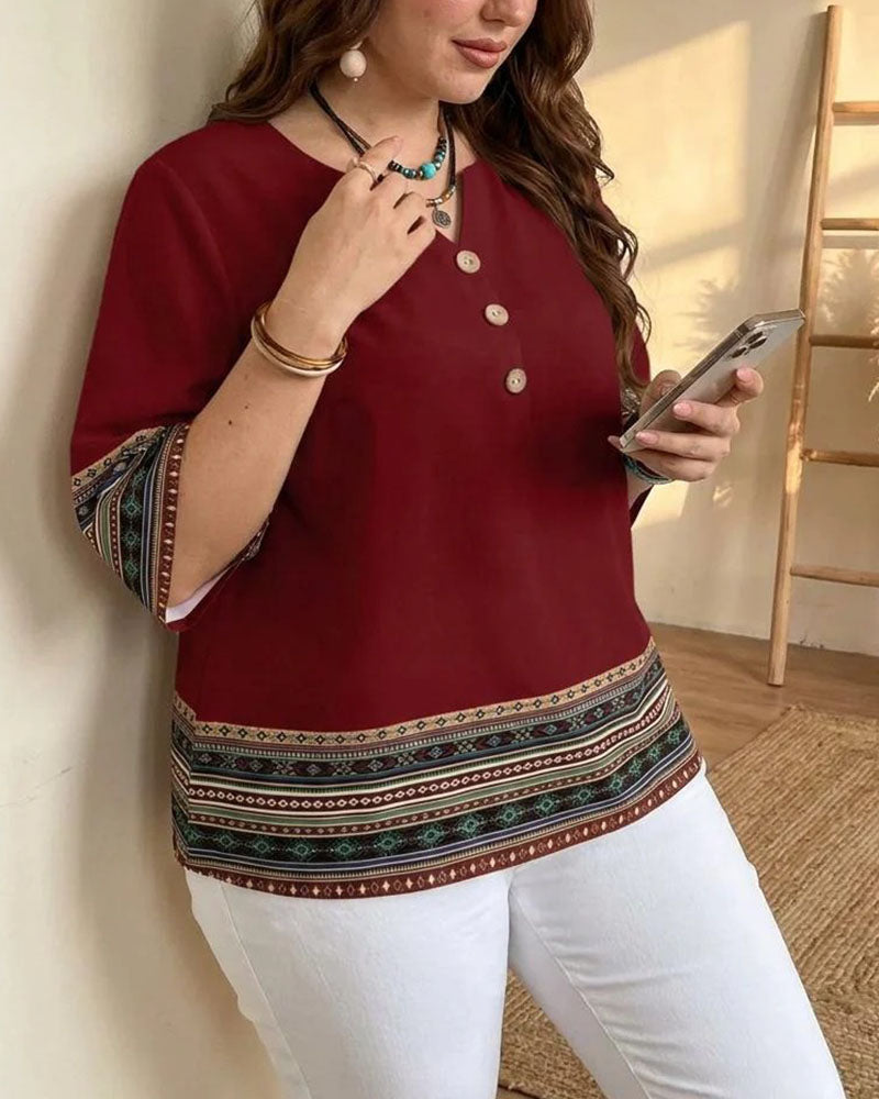 Blusa de rayas de estilo étnico con manga tres cuartos