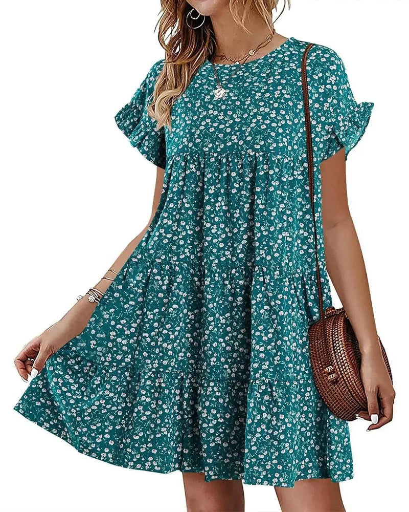 Vestido con volantes en las mangas, estampado  y corte escalonado