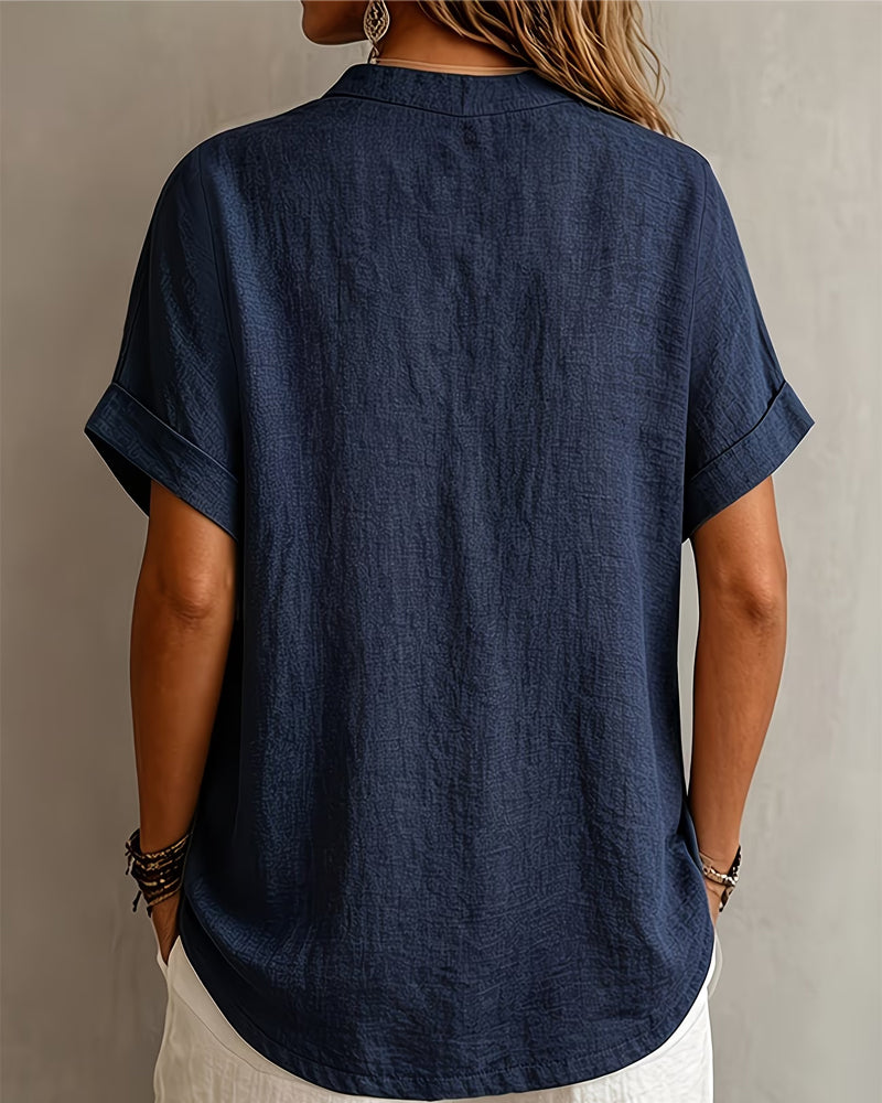 Blusa con cuello en V, manga corta y corte holgado