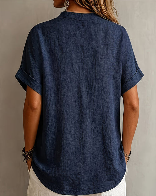 Blusa con cuello en V, manga corta y corte holgado
