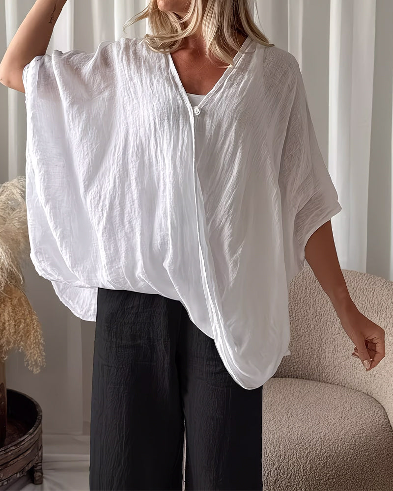 Blusa holgada con mangas de murciélago, lisa