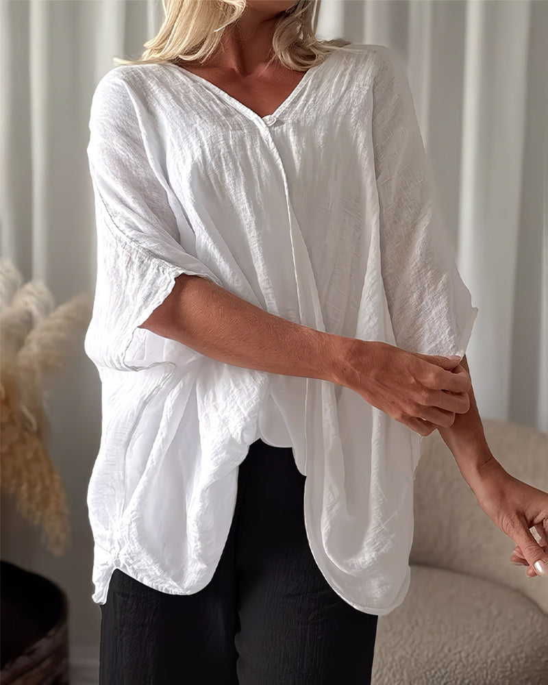 Blusa holgada con mangas de murciélago, lisa