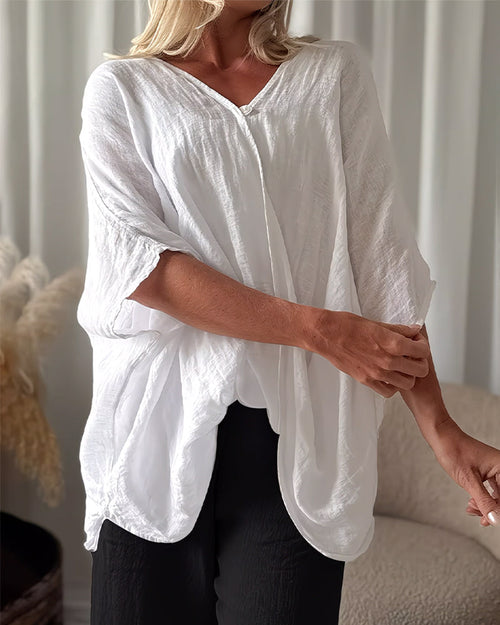 Blusa holgada con mangas de murciélago, lisa